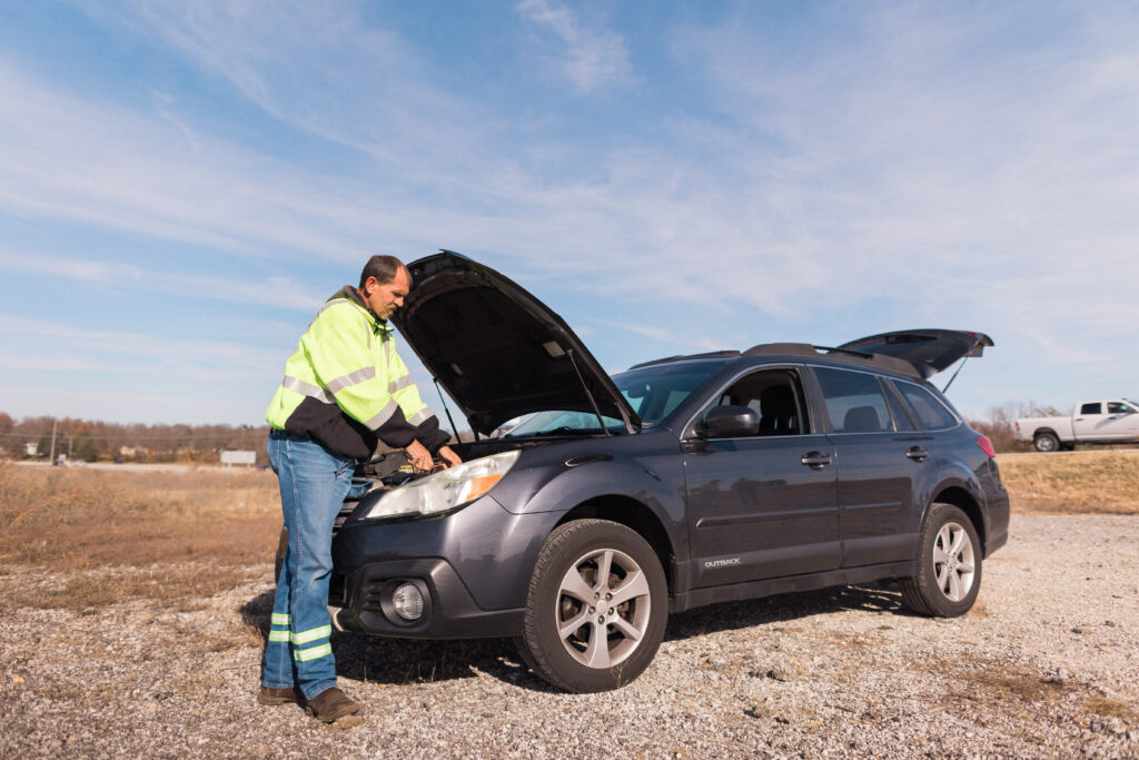 Rescue Towing technician performing roadside assistance services